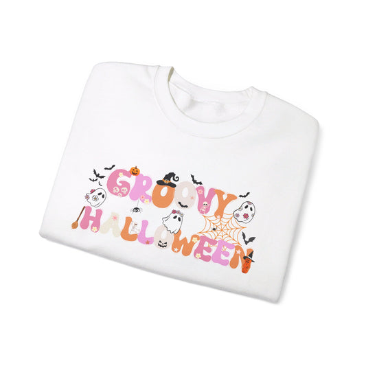 groovy halloween shirt folded with ghost pumkins and bats for halloween trick or treat bag